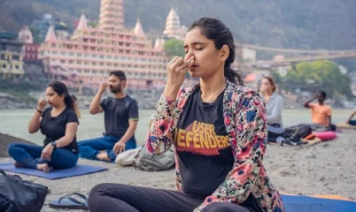 Ganga beach meditation session during yoga teacher training in Rishikesh