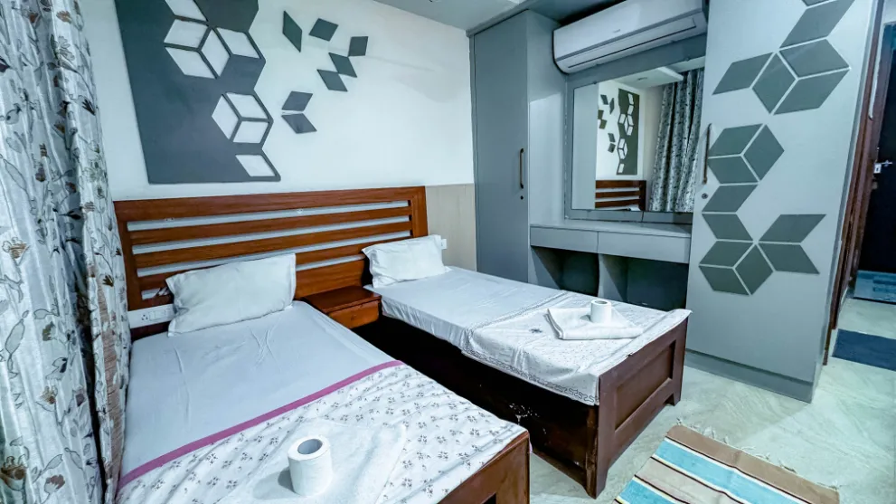 Two-sharing room interior at the Rishikesh yoga school