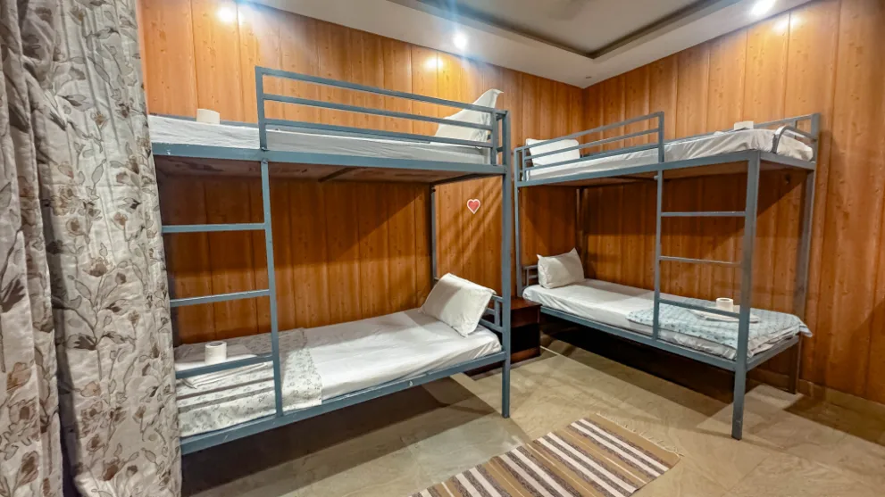 Bunk beds in a six-sharing dormitory at Vinyasa Yoga Academy Rishikesh