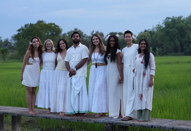 Retreat group on the walkway through the rice fields