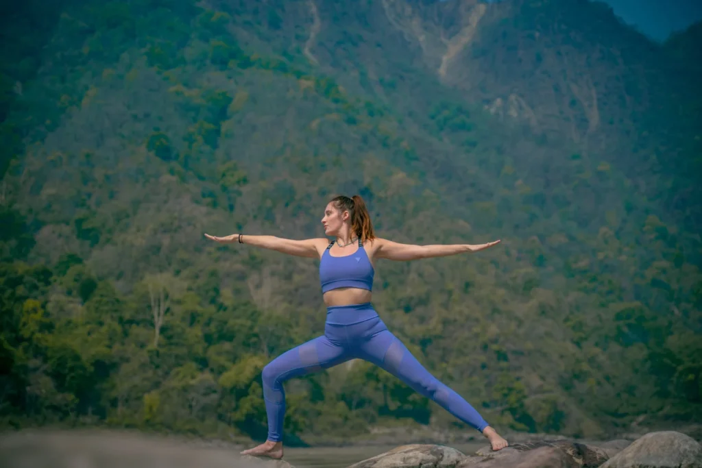 Student Performing Virabhadrasana  During Yoga Teacher Training Session at Vinyasa Yoga Academy