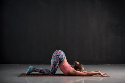 A Woman Practising Anahatasana A Woman Practising Anahatasana
