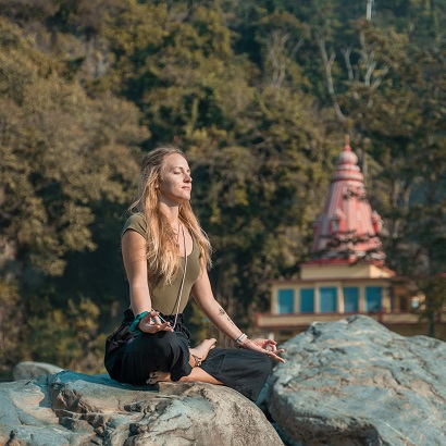 Student Performing Swastikasana (Auspicious Pose) 