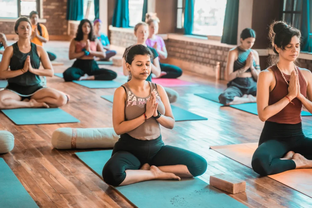 Student Performing Swastikasana (Auspicious Pose) 