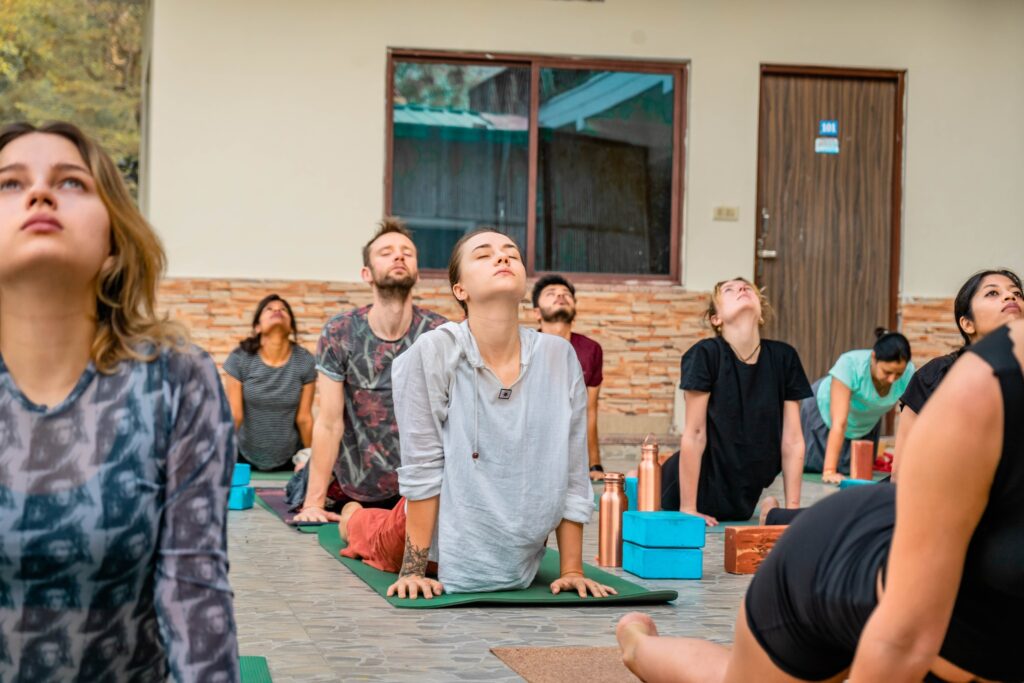 Student Practising Urdhva Mukha Svanasana (Upward-Facing Dog) During 200 hour Yoga TTC