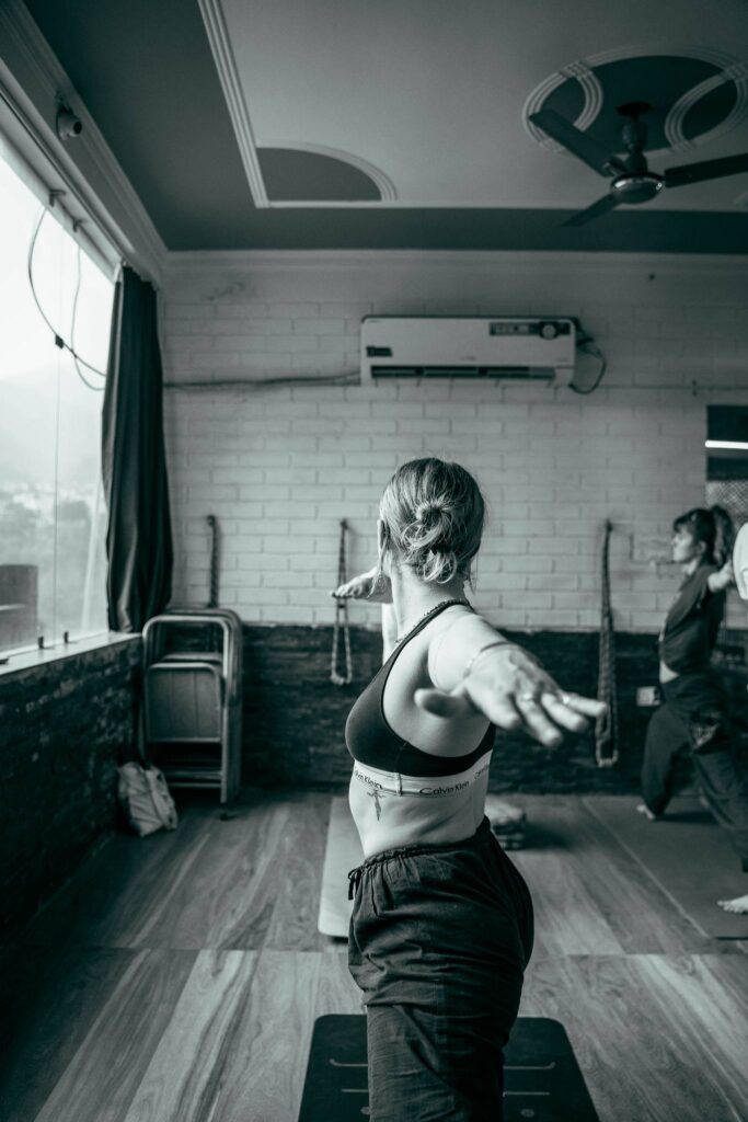 Student Practising Warrior II During 200 Hour YTTC at Vinyasa Yoga Academy