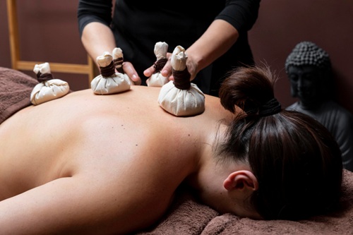Herbal Pouch Massage During Panchakarma Therapy
