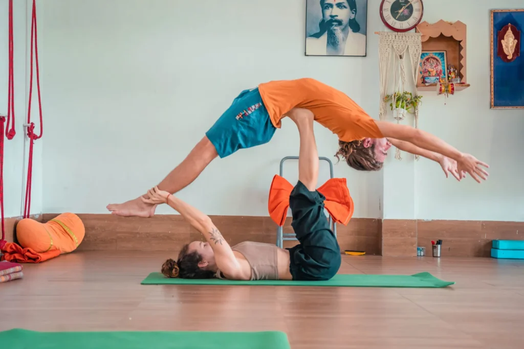 Student Performing Acro Yoga During 300 Hour Yoga Teacher Training at Vinyasa Yoga Academy